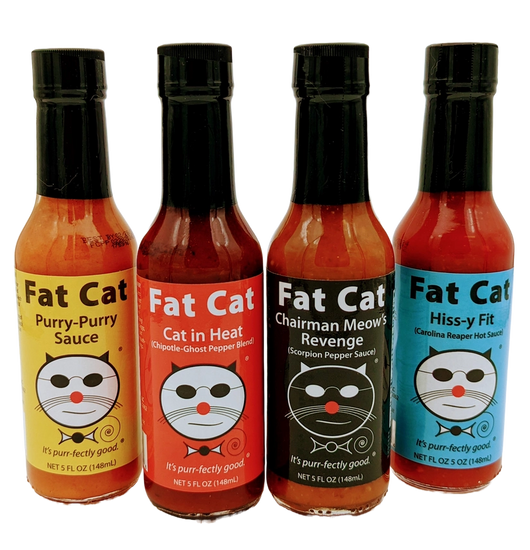 Coffret-cadeau de sauces piquantes Fat Cat, comprenant Purry-Purry, Cat in Heat, Chairman Meow's Revenge, et Hiss-y Fit.