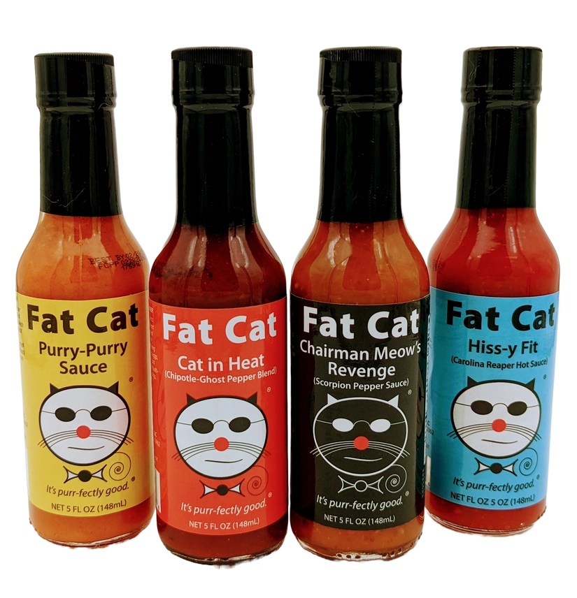 Coffret-cadeau de sauces piquantes Fat Cat, comprenant Purry-Purry, Cat in Heat, Chairman Meow's Revenge, et Hiss-y Fit.