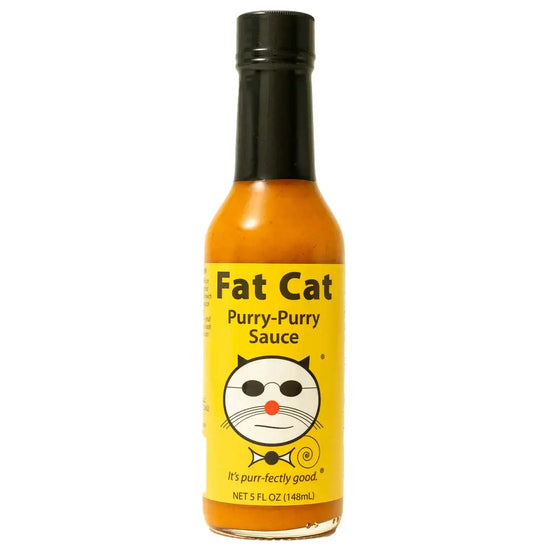 Purry-Purry Sauce by Fat Cat, Thai/Asian-inspired peri peri style sauce in a 5 fl oz bottle with a yellow label featuring a cartoon cat.